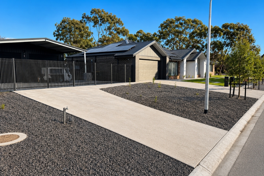 Concrete crossover and cost of a driveway meeting the kerb after council approval, Maiden Gully.