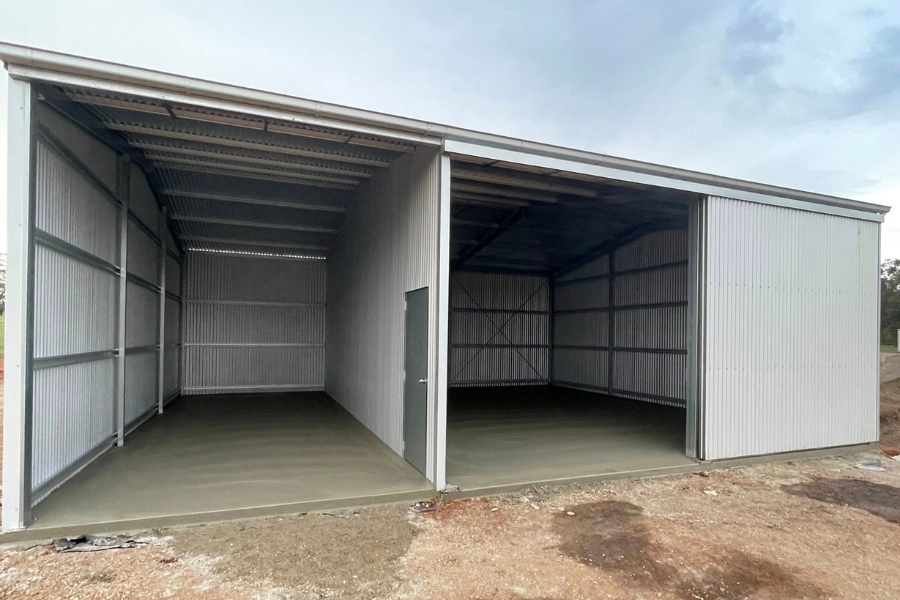 Finished shed slab inside a two-bay open steel shed, Bendigo.