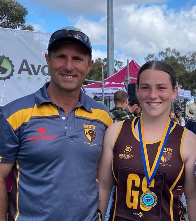 Leigh Whyte with his daughter after a Huntly Football Netball Club netball presentation.